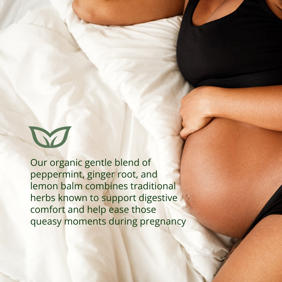 Pregnant woman with organic queasy tea gentle blend of peppermint, ginger root and lemon balm for natural nausea relief during pregnancy