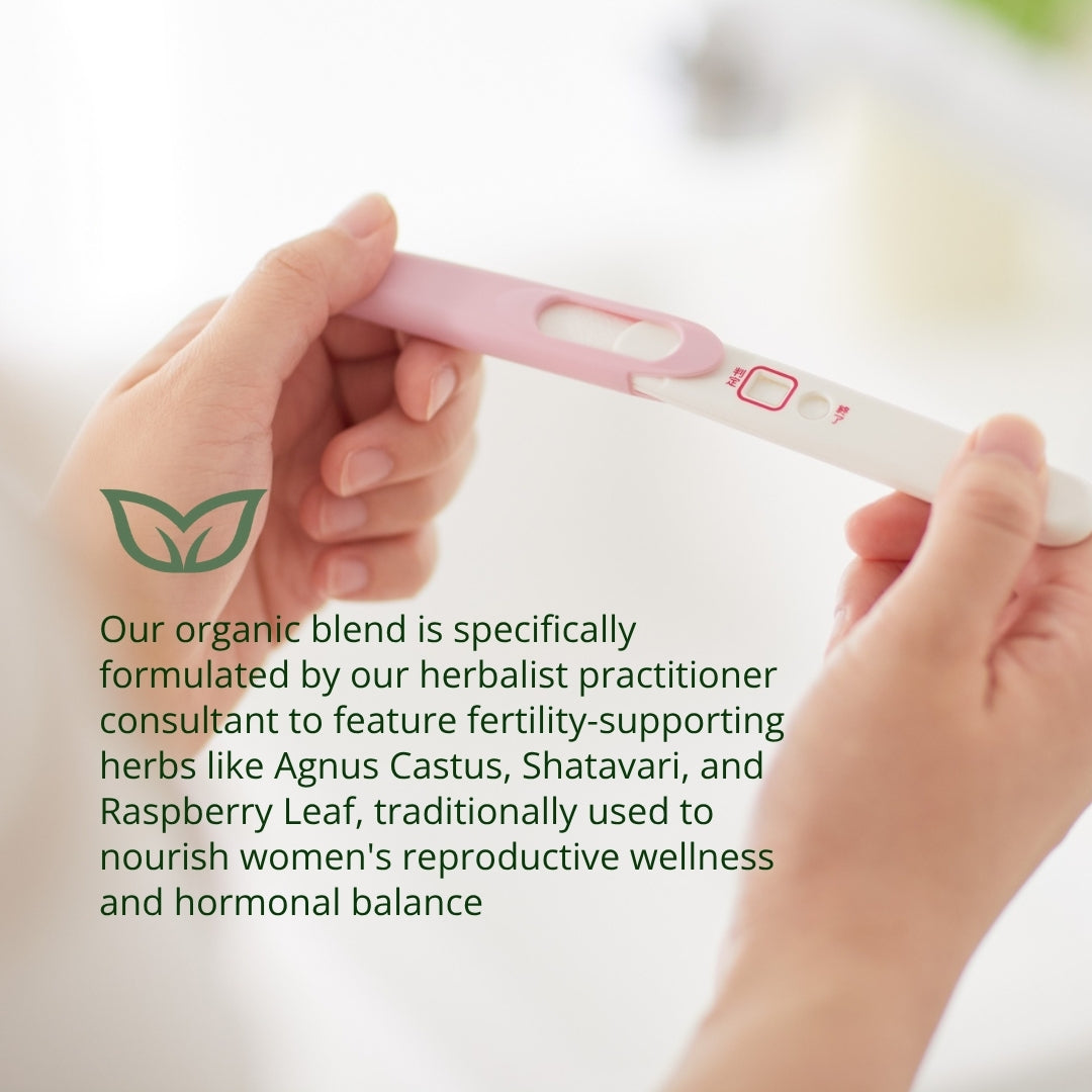 Woman holding pregnancy test organic fertility tea blend formulated by herbalist practitio