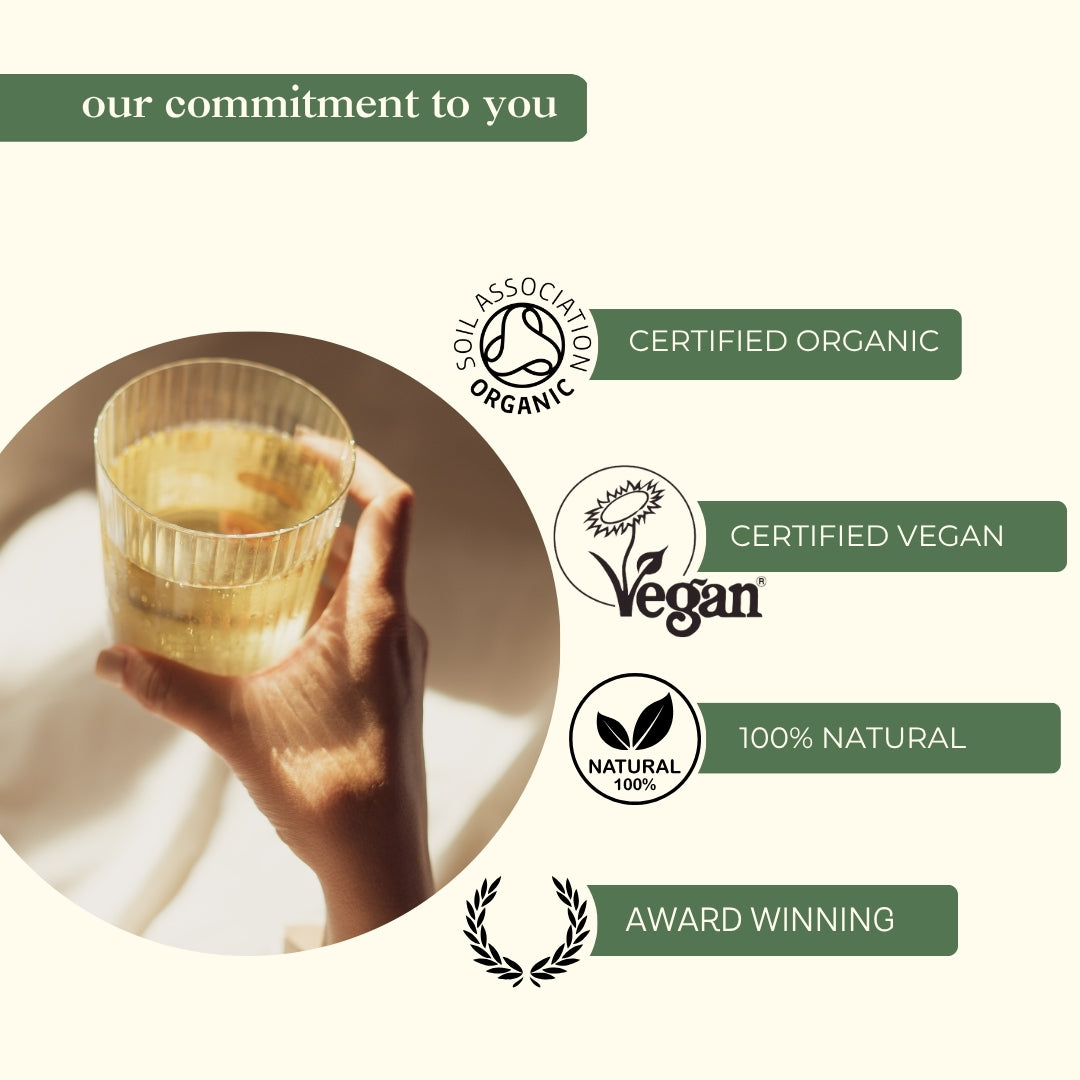 Certified organic vegan fertility tea award-winning natural herbal blend woman holding tea cup